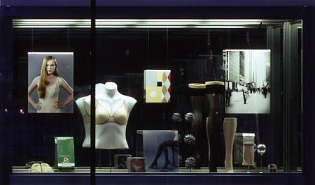 Josephine Meckseper, Blow Up (Tamara)
2006, Underwear box with photo mounted on rear, small paper sculpture, 2 clipstands, 2 glass balls, packaged knee high stockings, leg form (calf high with stocking), leg form (thigh high with stocking),