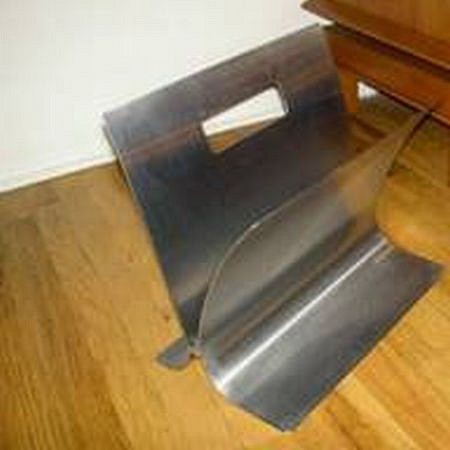 Francois Monnet, Polished Steel Magazine Rack
c. 1970